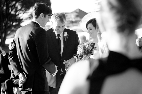 Black and white wedding ceremony bride and groom