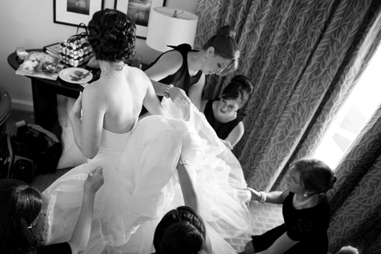 Bride getting ready with bridesmaids in monochrome