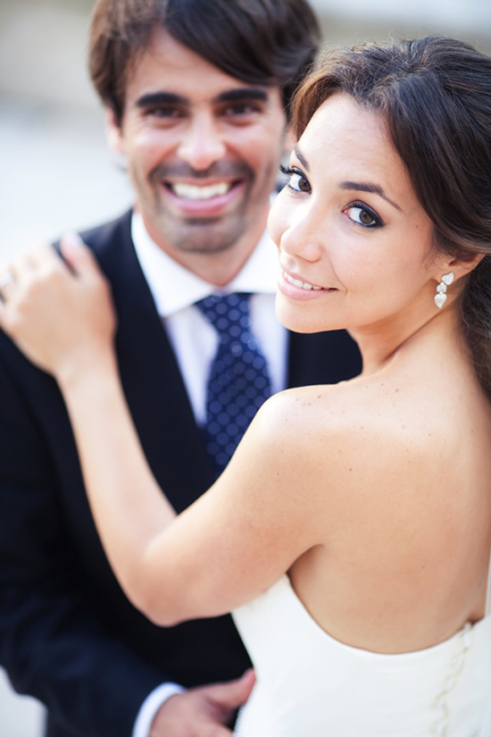 Happy bride and groom embracing on their wedding day