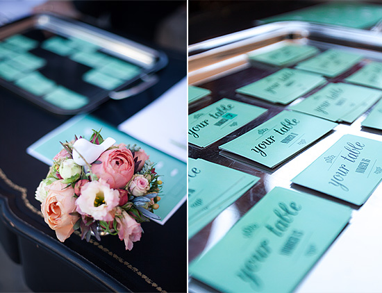 Wedding table number cards with floral arrangement