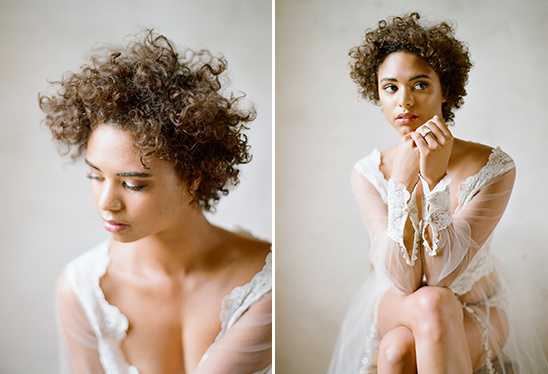 Beautiful woman with curly hair in a sheer dress