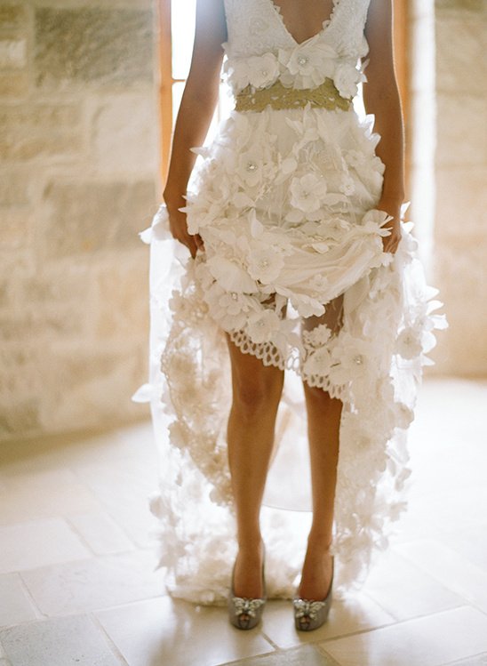 Stunning floral lace wedding dress with unique high-low hemline
