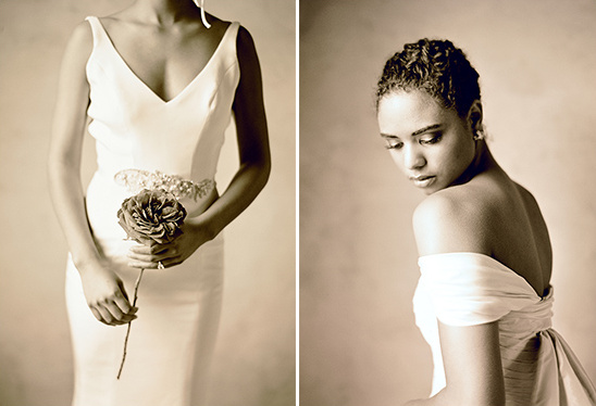 Elegant bride in two wedding gowns holding a rose