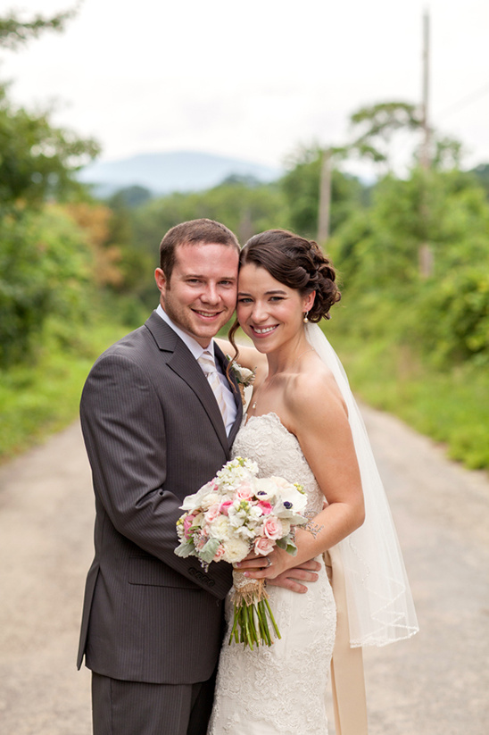 Happy bride and groom portrait on rural wedding day