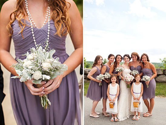 Bridesmaids in lavender dresses with wedding bouquets