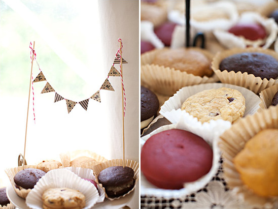 Wedding dessert table with mini cakes and banner
