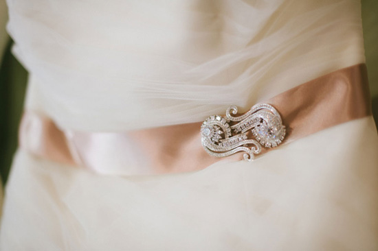 Elegant wedding dress sash with jeweled clasp detail