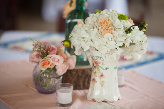 Elegant white and peach roses in vintage vase