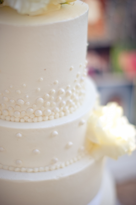 Elegant wedding cake with pearl decorations