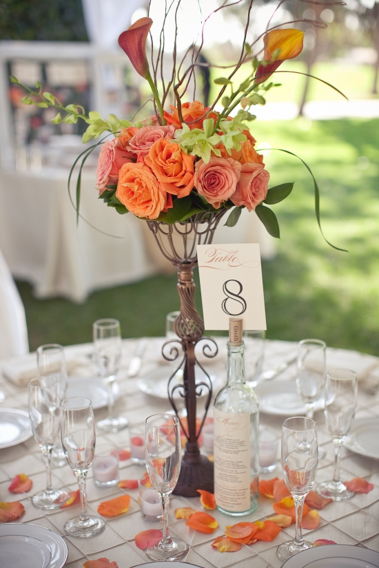Orange rose centerpiece with table number eight