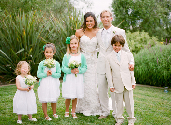 Bride and groom with flower girls and ring bearer