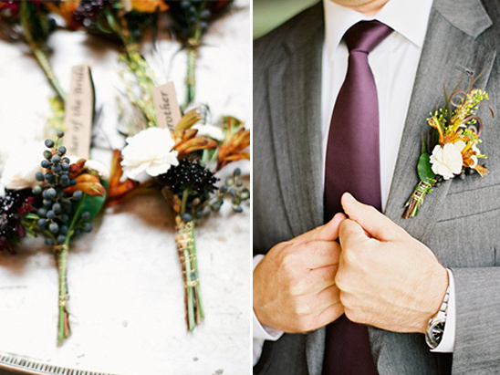 Groomsmen boutonnieres and groom in suit at a wedding