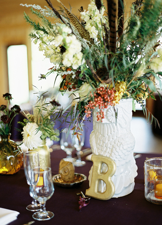 Elegant floral centerpiece in owl vase with letter B