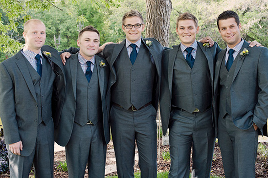 Groom and groomsmen in dark suits