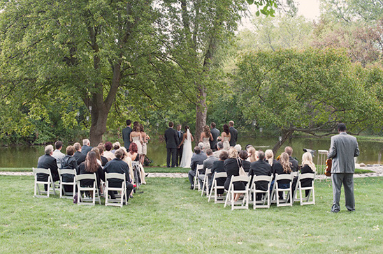 Outdoor wedding ceremony by lake