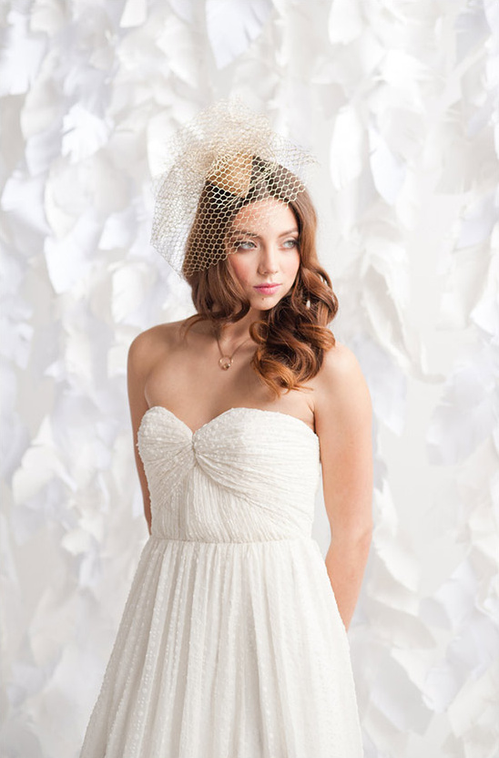 Beautiful bride in wedding dress and hat