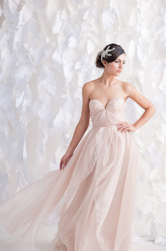 Elegant blush wedding dress with accessory
