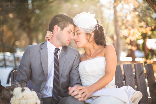Romantic wedding couple sharing a tender moment