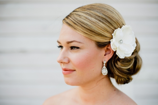 Bride with flower hair piece and elegant earring