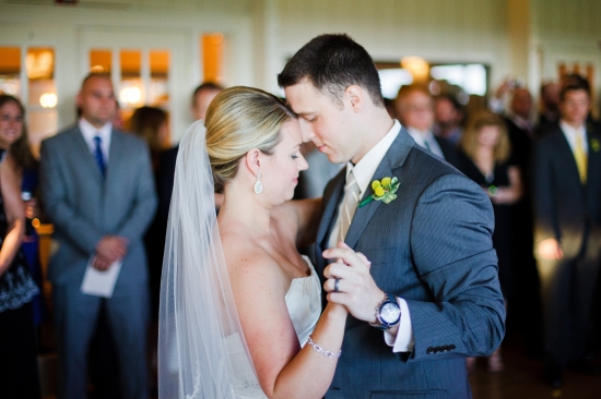 Bride and groom enjoy their first dance at wedding reception