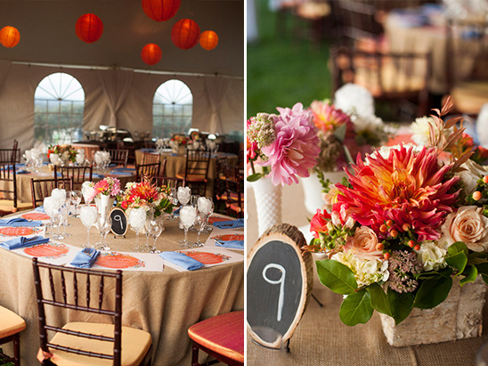 Rustic wedding table number nine with flowers