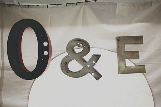 Vintage metal letters spelling O&E