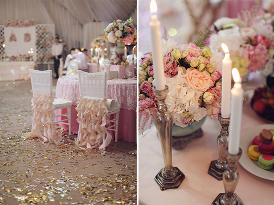 Romantic wedding reception decor with pink floral arrangements and elegant chair sashes