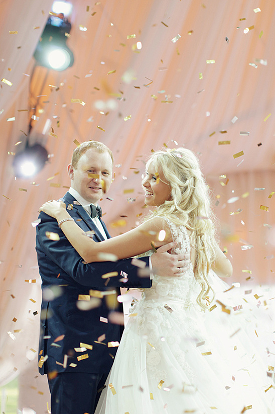 Happy couple's first dance amidst confetti