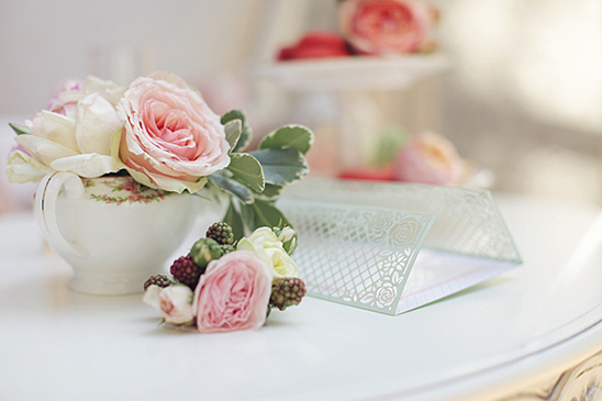 Delicate pink and white roses in a vase