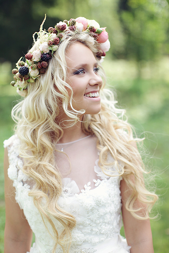 Woman in floral crown, wedding dress