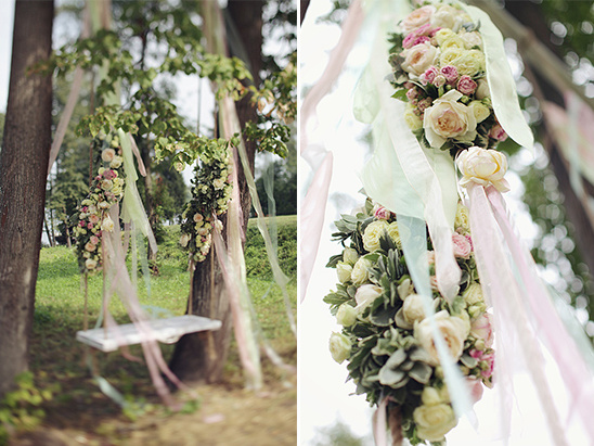 Floral decorated swing in garden