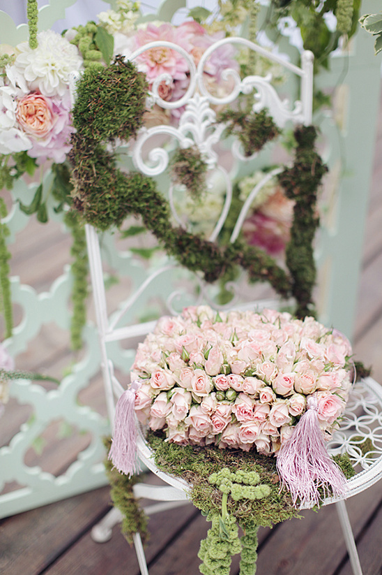 Beautiful floral arrangement on chair