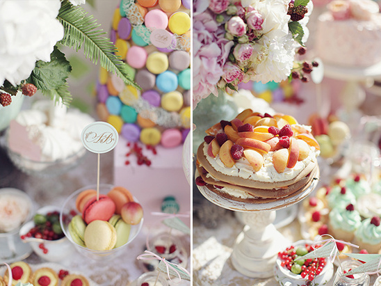 Delicious dessert table with macarons and fruit cake