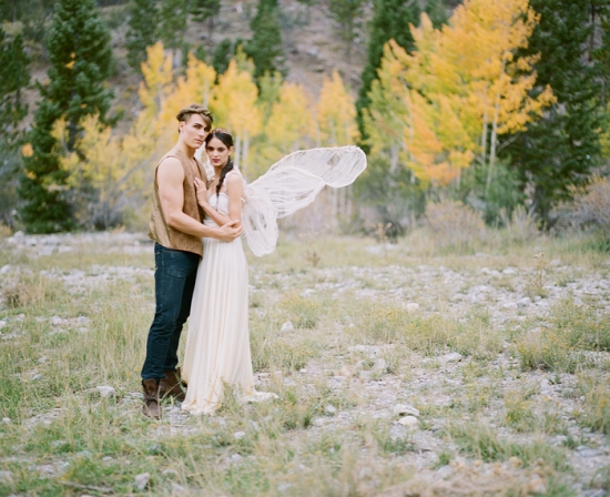 Couple in ethereal outdoor wedding photoshoot autumn trees