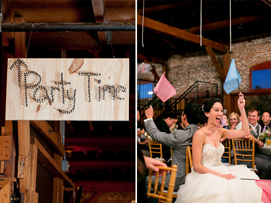 Wedding party celebrating with flags and a Party Time sign