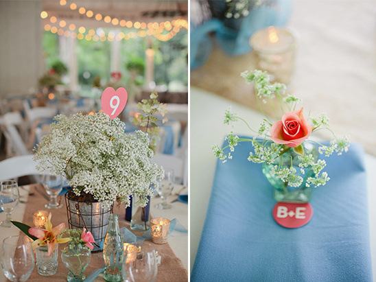 Rustic wedding table decor with baby's breath and numbers