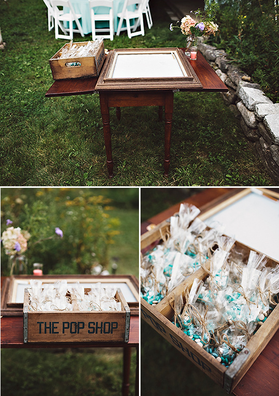 Wooden table with gifts and favors