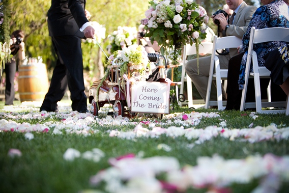 Wedding ceremony with bride arrival sign