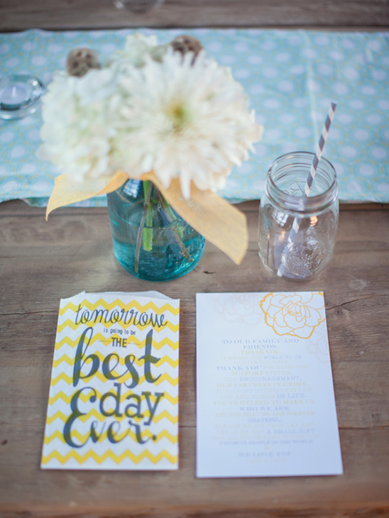 Wedding table setting with flowers and a best day ever message