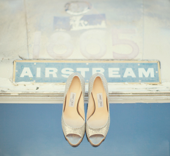 Elegant sparkly heels against an Airstream backdrop