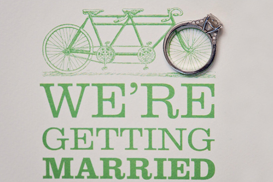 Engagement ring on tandem bike wedding announcement