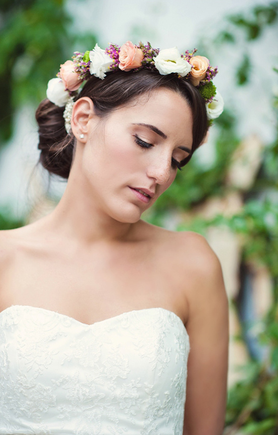 Beautiful bride in floral crown and wedding dress