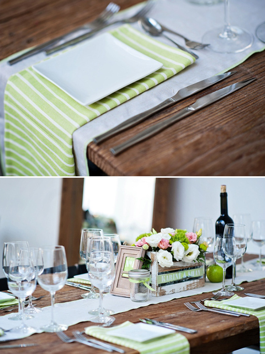 Elegant rustic wedding table setting with lime green napkins