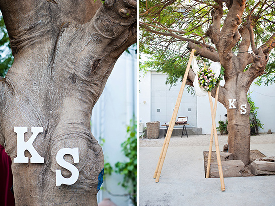 Wooden letters KS wedding arch tree
