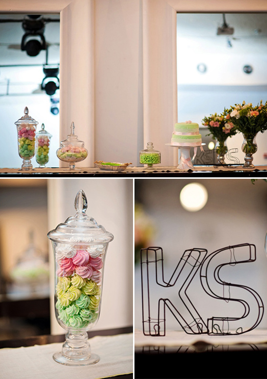 Colorful meringues in glass jars, party treats