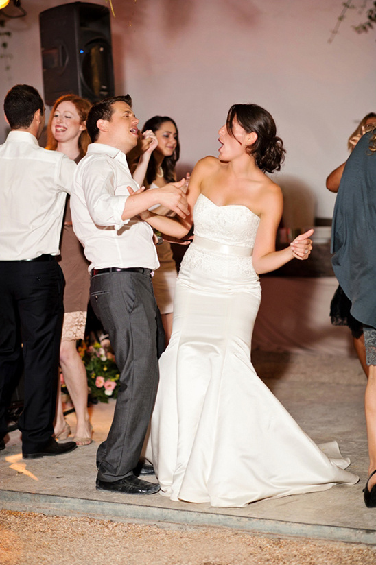Happy couple dancing at wedding reception