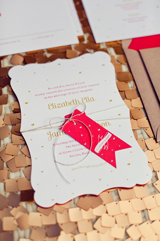Elegant wedding invitation with gold lettering and tag