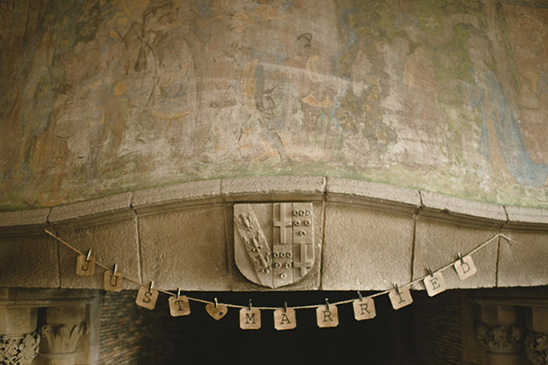 Just Married banner on antique fireplace mantel