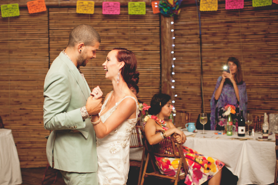 Bride and groom share a joyful dance at their wedding