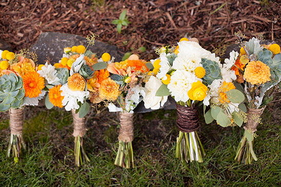 Colorful wedding bouquets tied with twine